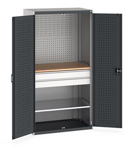 Bott cubio kitted cupboard with lockable steel perfo lined doors 1050mm wide x 650mm deep x 2000mm high.  Supplied with Perfo/Louvre back panels, 1 x wooden worktop, 1 x metal shelf and 2 drawers.   Shelf capacity 100kgs. Drawer Capacity 75kgs. ... Bott1050mm Wide Industrial Tool Cupboards